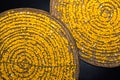 Yellow silkworm cocoon in basket from bamboo