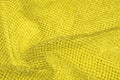 Yellow silver mesh fabric, with a woven metallic thread. Bring i