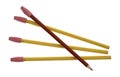 Yellow and a single red artist pencil with eraser caps Royalty Free Stock Photo