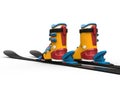 Yellow ski boots - black skiis Royalty Free Stock Photo
