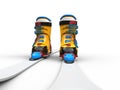 Yellow ski boots - white skiis Royalty Free Stock Photo