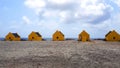 Yellow slave houses on the beach of Bonaire Royalty Free Stock Photo