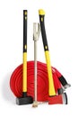 Yellow sledgehammer, axe, hooligan bar and fire hose from fireman`s toolbox Royalty Free Stock Photo