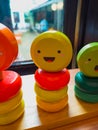 Yellow Smiley wooden logic toy for Kids