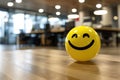 A Yellow Smiling Ball Can Promote a Positive Work Environment.