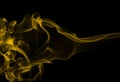 Yellow smoke abstract on black background for design Royalty Free Stock Photo