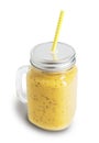 Yellow smoothie with chia seeds in mug