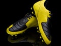 Yellow soccer footwear