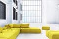 Yellow sofas in an office waiting area Royalty Free Stock Photo