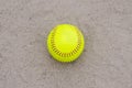 Yellow Softball on field Royalty Free Stock Photo