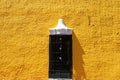 Yellow spanish colonial style wall in Valladolid