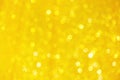 Yellow sparkle bokeh glitter abstract on background Royalty Free Stock Photo