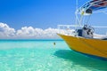 Yellow speedboat on the beach of Playacar at Caribbean Sea of Mexico Royalty Free Stock Photo