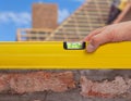 Yellow spirit building level in construction site. Royalty Free Stock Photo