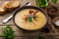 Yellow split peas soup with fried bacon