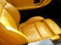 Yellow sport shaped leather vehicle seat