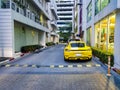 Yellow sports car parked in Bangkok Thailand