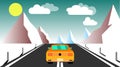 Yellow sporty fast beautiful powerful car rides along the road against a background of a mountain winter landscape and evening clo