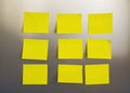 Yellow square stickers are glued to the refrigerator. Sheets for recording information