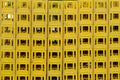 Yellow Stackable Plastic Bottle Boxes. Lots of empty used glass container crates.