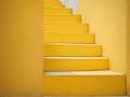yellow stairs with a cement background Royalty Free Stock Photo