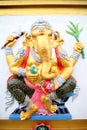 Yellow Statue Ganesh in temple.