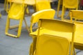 Yellow steel chair at outdoor restaurant or beer garden Royalty Free Stock Photo