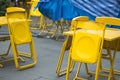 Yellow steel chair at outdoor restaurant or beer garden Royalty Free Stock Photo