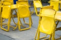 Yellow steel chair at outdoor restaurant or beer garden Royalty Free Stock Photo