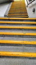 Yellow steps near local train station