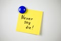 Yellow sticker inscription Never say die! Royalty Free Stock Photo