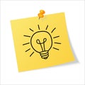 Yellow sticker pinned push button with curled corner and hand draw lightbulb Royalty Free Stock Photo