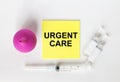 Yellow sticker with text Urgent Care on a white background with syringes, enema and ampoule