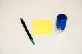 Yellow sticky memo pad, round rubber stamp and pen