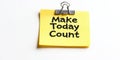 Yellow Sticky Note Clipped to White Surface With Inspirational Message Make Today Count Royalty Free Stock Photo