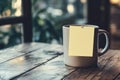 Yellow sticky note on coffee mug Royalty Free Stock Photo