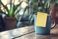 Yellow sticky note on coffee mug Royalty Free Stock Photo