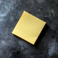 Yellow Sticky Note on Dark Surface Royalty Free Stock Photo