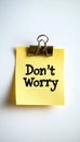 Yellow Sticky Note with Don t Worry Message, Isolated on White Background With Copy Space Royalty Free Stock Photo