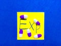 Capsules arranged over 'exp' on a sticky note hint at expired medicine and health caution Royalty Free Stock Photo