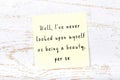 Yellow sticky note with handwritten motivational quote