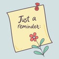 Yellow sticky note with just a reminder text and a flower pinned on a light blue background image Royalty Free Stock Photo