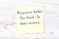 Yellow sticky note with handwritten motivational quote