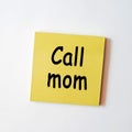 Yellow sticky note with the word call mom Royalty Free Stock Photo