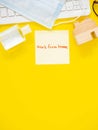 Yellow sticky paper Write a handwritten message `work from home` on keyboard with hand sanitizer alcohol gel, medical face mask,