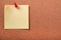 Yellow sticky post note pinned cork board copy space Royalty Free Stock Photo