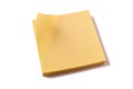 Yellow sticky post notes pad white background corner curled Royalty Free Stock Photo
