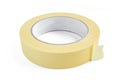 Yellow sticky tape roll isolated on white. Duct tape close-up