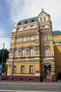 Yellow stone historical 19th century building in russian architectural style in Moscow