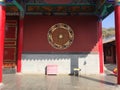 A yellow stool and a pink bedside table in the Buddhist Temple Royalty Free Stock Photo